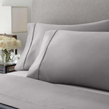 Egyptian cotton sheet set in zinc gray, with pillowcases and flat sheet trim