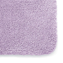 Wisteria bath rug texture with dense plush loop pile.