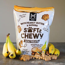 Soft & Chewy dog treat bag with paw-shaped cookies and bananas beside it