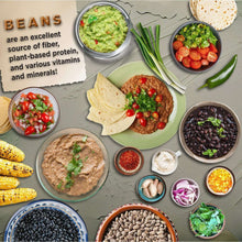 Pinto beans served in a bowl with toppings and side dishes