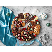 Assorted holiday cookie and candy assortment with nuts and pecan pieces.