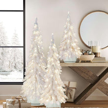 Set of three pre-lit iridescent topiary trees, tall white