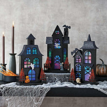 Pre-lit metal Halloween houses set of 3 with multicolor glowing windows and jack-o-lantern