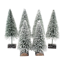Set of four flocked pine trees with dark bases