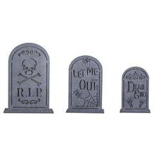Three gray arched pre-lit tombstones with R.I.P, Let Me Out, and Dead skull graphics