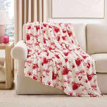 Valentine lounge throw with red bows and hearts pattern on white
