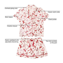 Pajama set features: notch collar, chest pocket, 5-button front, elastic-waist shorts