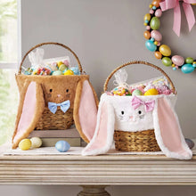 Pair of bunny Easter baskets: tan with blue bow and white with pink bow, woven wicker