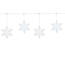 LED snowflake light string with multiple glowing snowflake shapes on a wire