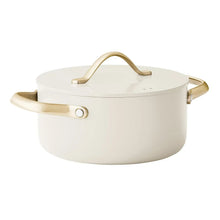 Cream ceramic stockpot with lid and gold-tone handles