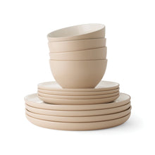 Two-tone stoneware dinnerware set with beige bowls and plates, stacked