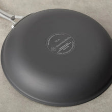 Hard anodized nonstick lid, dark gray with quality label on center