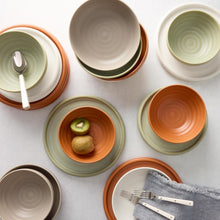 Bubble reactive dinnerware set bowls and plates in taupe, green, and orange