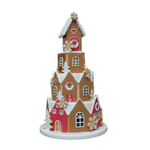 Pre-lit gingerbread village ornament, tall house with candy decorations and white snow trim
