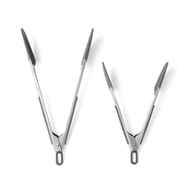 Two stainless-steel tongs with dark grips, hinged ends, 12 in and 9 in