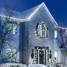 LED mini string lights with clear bulbs along house exterior eaves and wreaths