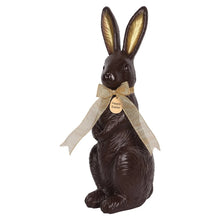 Chocolate bunny décor with dark brown body, tall ears, beige ribbon, and “Happy Easter” tag