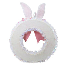 White tinsel bunny wreath with pink ribbon bow and inner cutout face detail