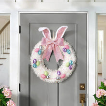 Tinsel bunny wreath with pink bow and multicolor egg ornaments, for door or wall decor