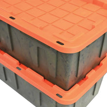 Corner view of heavy-duty storage tote with orange rim and dark side walls
