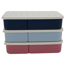 Stacked bento boxes with white lid and blue wavy pattern, light blue and dark blue bases