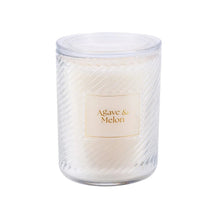 Ribbed glass candle with Agave & Melon label and clear lid, clear-white glass jar