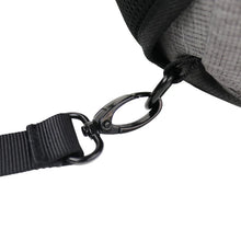 Gray backpack with black metal carabiner and webbing strap attachment