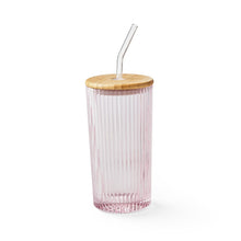 Pink-tinted glass tumbler with bamboo lid and clear straw