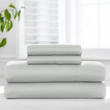 Folded light gray sheet set stack with smooth fabric texture