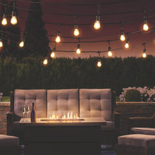 Outdoor café string lights with warm LED bulbs on black cord