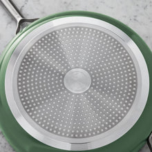 Green ceramic lid with stainless perforated insert and center cap