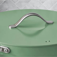 Green ceramic jumbo cooker lid with curved stainless handle