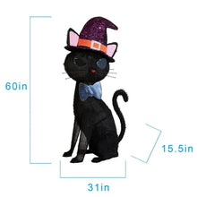 Pre-lit black cat decoration with purple glitter witch hat and glowing blue eyes, standing.