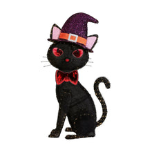 Pre-lit black cat decoration with purple glitter witch hat, red glowing eyes, and red bow.