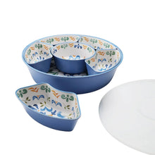 Blue lazy susan serving platter with six divided trays and a center dip bowl