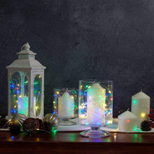 Multicolor LED micro wire lights on clear wire with small glowing bulbs