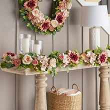 Pink and cream spring floral garland with roses and hydrangea-style blooms