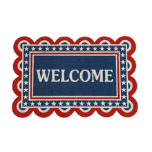 Americana welcome coir doormat with centered blue “WELCOME” text, star border, red outline