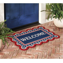 Americana welcome coir doormat with blue “WELCOME” panel, red trim, scalloped edge