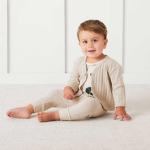 Baby organic cotton cardigan, light beige knit with V-neck and snap front
