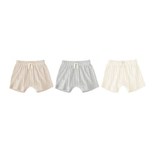 3-pack baby bloomer shorts: light tan, light gray, and white with ties