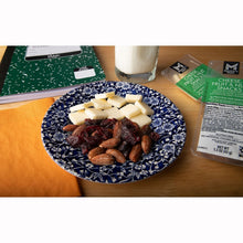Cheese, fruit & nut snacks served in a bowl with almonds and dried cranberries