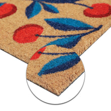 Coir doormat corner with cherry and leaf print in red and blue on tan