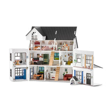 Mansion dollhouse with open interior showing rooms, stairs, kitchen and dining areas