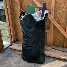 Black 42-gallon contractor clean-up bag, heavy duty 3 mil, filled upright