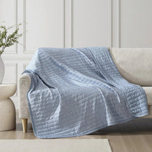 Light blue cooling throw blanket, quilted channels with rounded edge and stitched details