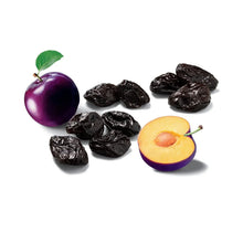 Pitted dried prunes with sliced prune, dark purple fruit and pitless pieces