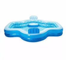 Inflatable round pool with raised center inflatable insert and blue rim