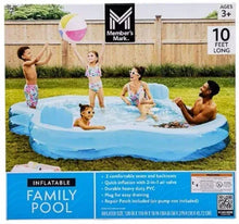 Inflatable family pool with blue outer ring, center seat, and two air valves