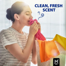 Woman holding fresh-scent laundry near dryer sheets, with 'clean, fresh scent' text.